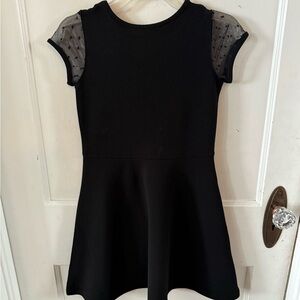 2 Girls Black dresses size 6x-7. New.